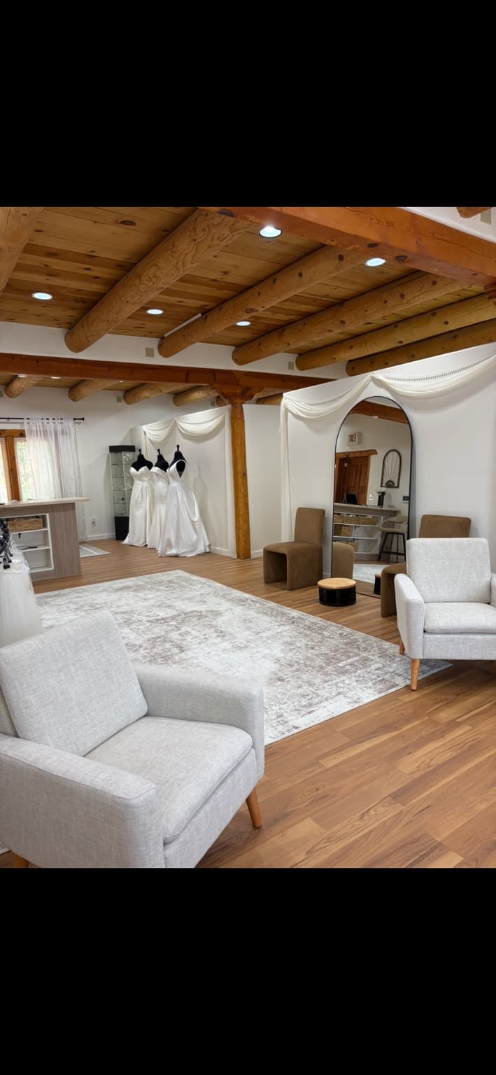 Bridal boutique showroom with seating and display space